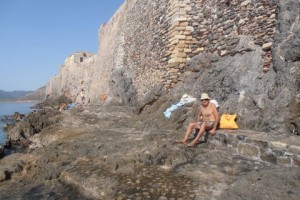 THE PORTELLO-swimming coast with city walls as background